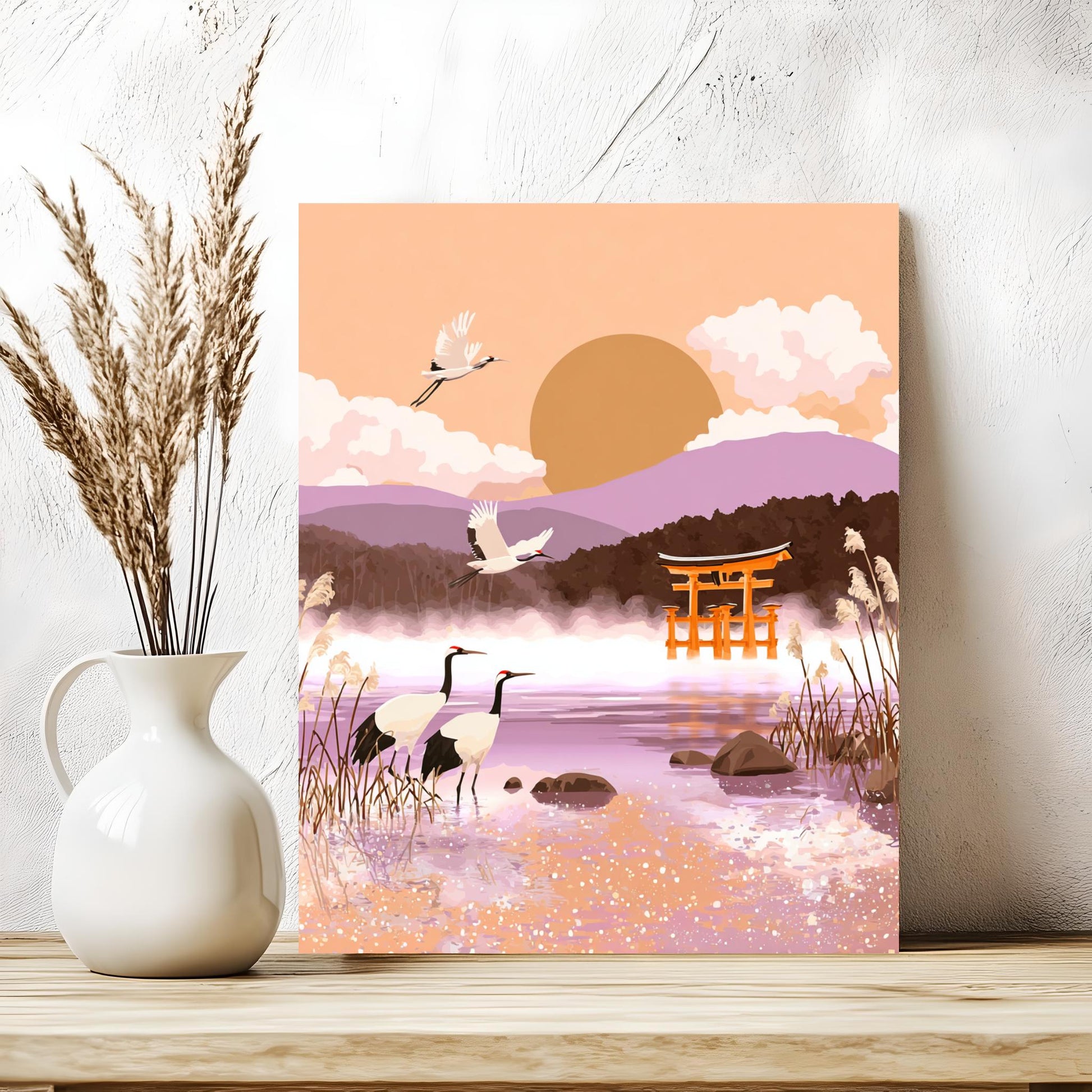 a serene landscape with a Japanese torii gate, two cranes, and a sunset over a mountain range.
