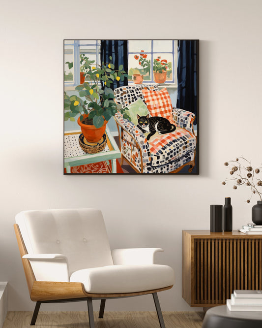 Black and white cat with a lemon tree