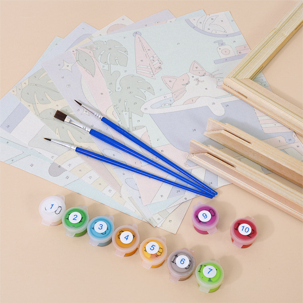 various art supplies, including paintbrushes, paint tubes, and a partially completed puzzle or coloring book.
