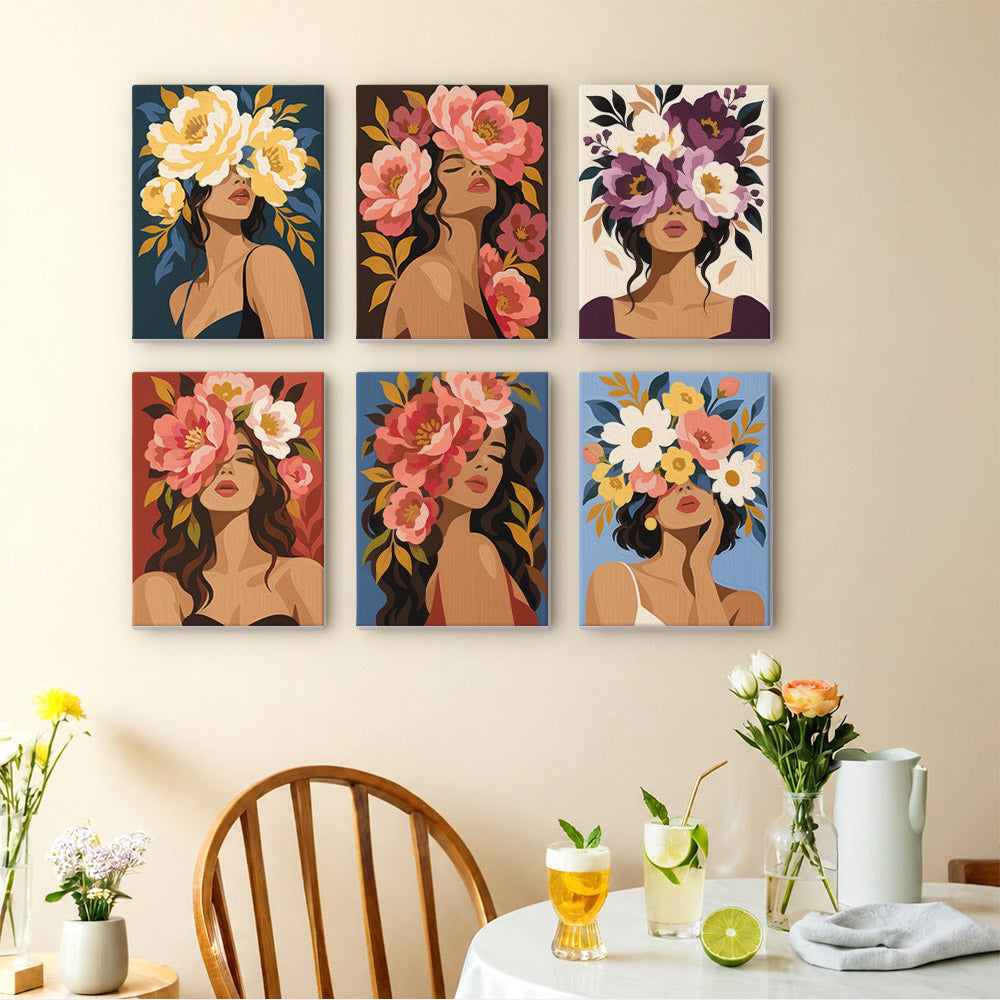 a wall with six colorful paintings of women's faces with flowers on their heads, arranged in a grid pattern.