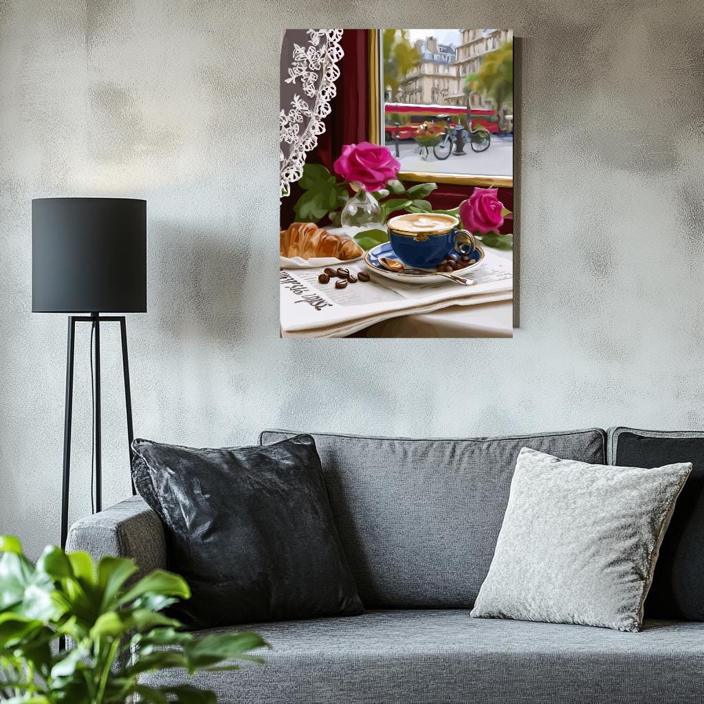 a cozy living room with a gray couch, a black floor lamp, and a framed painting of a cup of coffee and pastries on a table.
