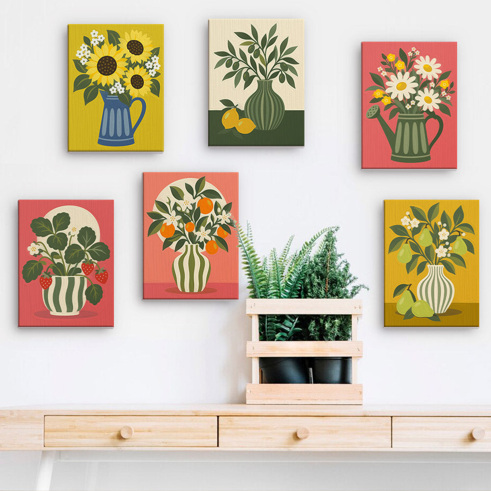 a wall with six colorful paintings of flowers and plants, including sunflowers, oranges, and potted plants, arranged in a row on the wall.