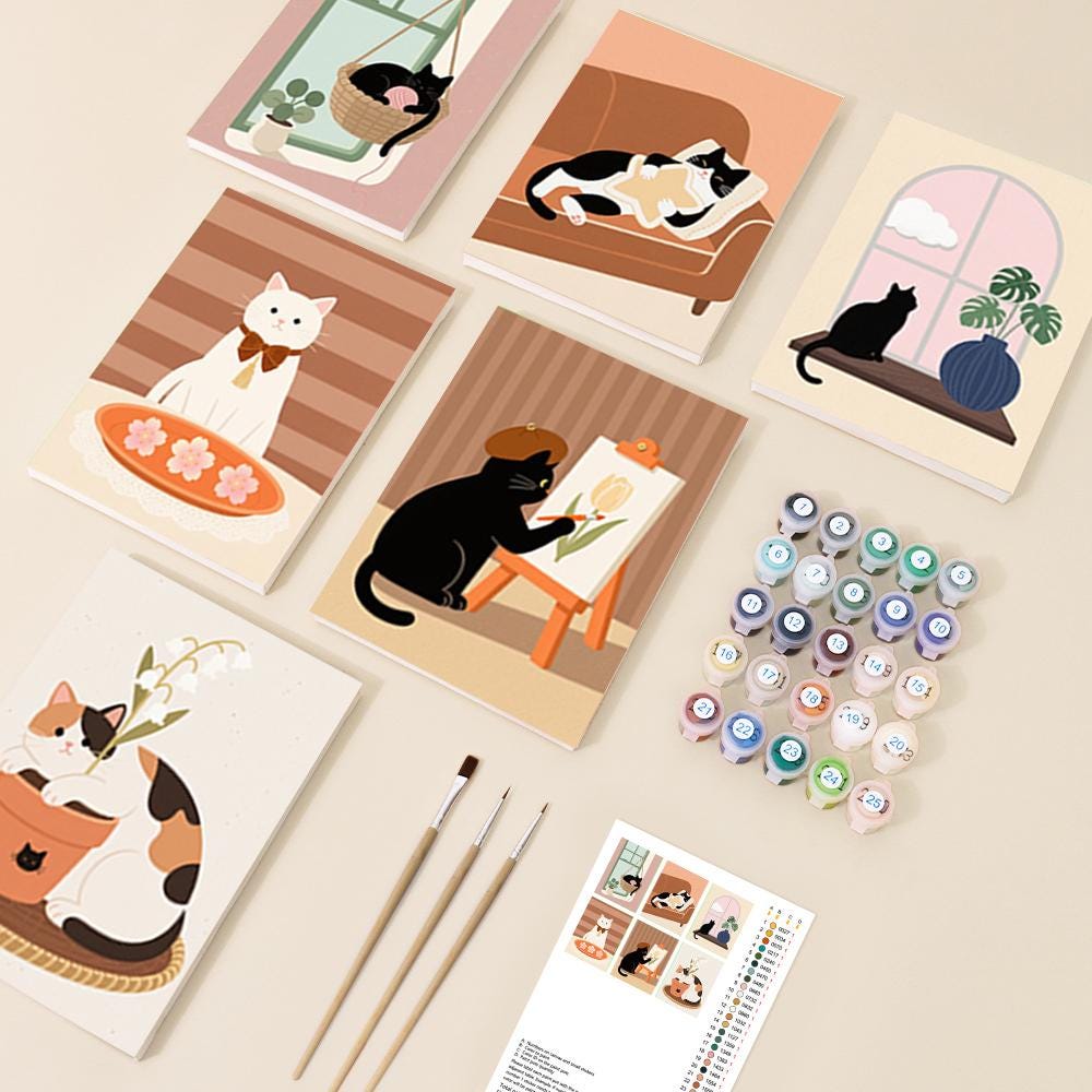 various illustrations of cats, art supplies, and a painting kit, suggesting a creative or artistic theme.