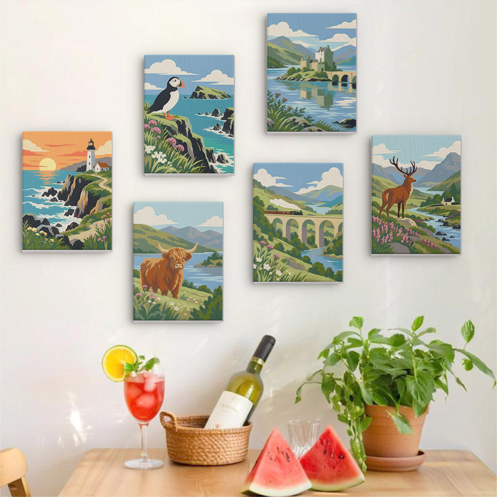 a wall with six framed paintings depicting various landscapes, including a lighthouse, a castle, a bridge, a cow, a deer, and a river. There is also a table with a wine bottle, a glass, and a basket of fruit, as well as a potted plant and a watermelon slice.
