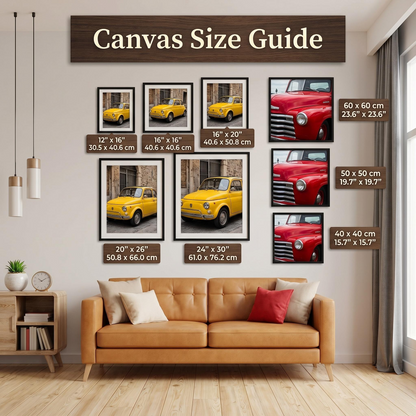 The image is a living room with a brown leather couch and a wooden side table. Above the couch, there is a wooden sign displaying a canvas size guide for artwork, including images of various cars and a clock.