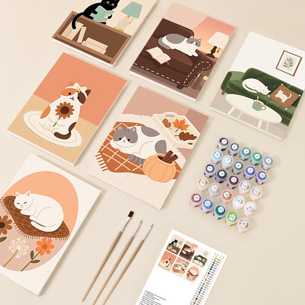 various illustrations of cats, art supplies, and a painting kit, suggesting a creative or artistic theme.