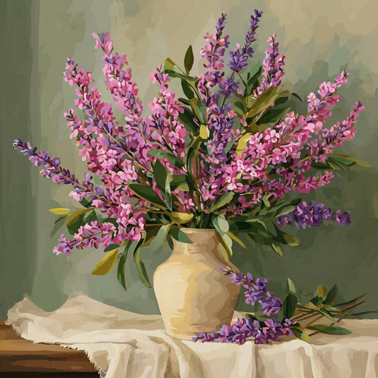 A vase filled with vibrant purple and pink lilac flowers sits on a table draped with a white cloth.