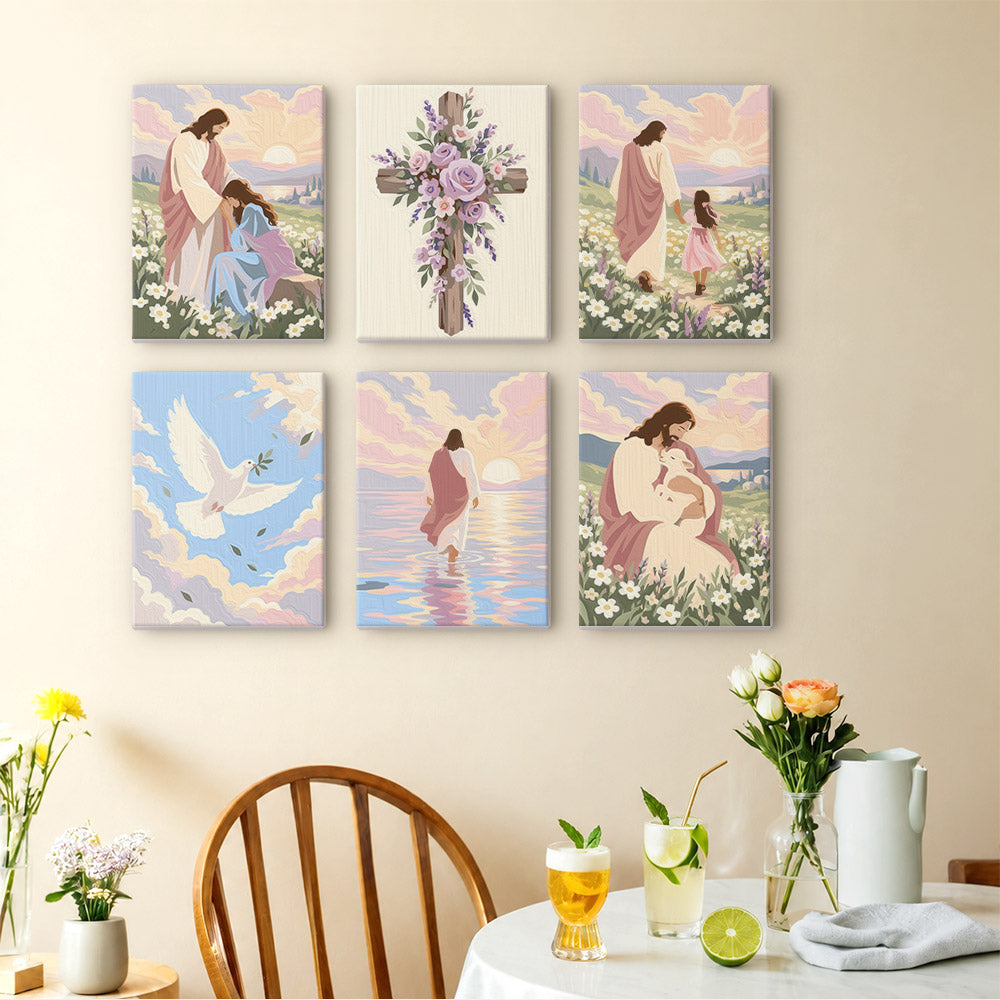 The image is a wall display featuring six paintings depicting various scenes related to the life of Jesus Christ. The paintings include images of Jesus walking, holding a baby, and other religious and pastoral scenes. The wall display is set against a light-colored wall, and there is a table with drinks and flowers in the foreground.