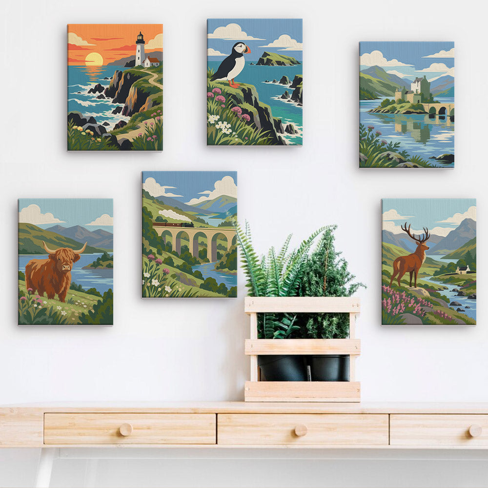 a wall with five framed paintings depicting various landscapes, including a lighthouse, a castle, a bridge, a cow, and a deer.