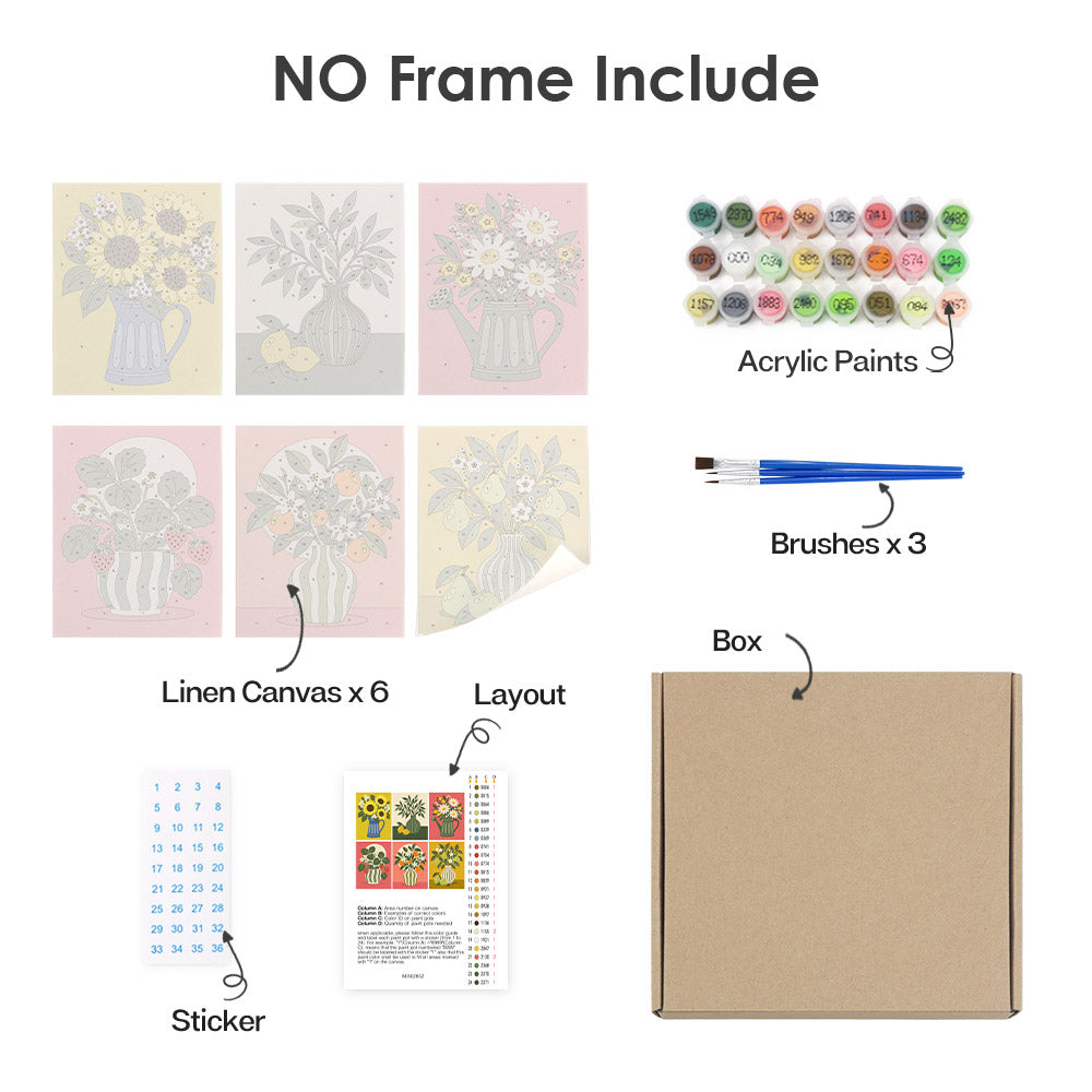 various art supplies and materials, including a box, acrylic paints, brushes, a layout, and a sticker.